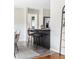 Chic kitchen area with granite counters, breakfast bar, and stainless steel refrigerator at 118 Wheelan School Rd, Dallas, GA 30157
