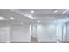 Unfinished basement area with neutral walls and flooring, plus access to other rooms at 2726 Riderwood Ne Ln, Marietta, GA 30062