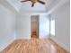 Bedroom featuring vaulted ceiling, hardwood floors, and doorway to an adjoining room at 2726 Riderwood Ne Ln, Marietta, GA 30062