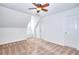 Bright bedroom featuring neutral carpet, a ceiling fan, and two entry doors at 2726 Riderwood Ne Ln, Marietta, GA 30062