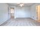 Bright bedroom featuring carpeted floors, white walls and ceiling fan at 2726 Riderwood Ne Ln, Marietta, GA 30062