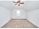 Spacious bedroom features a vaulted ceiling, carpet and a ceiling fan at 2726 Riderwood Ne Ln, Marietta, GA 30062