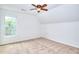 Bedroom featuring carpeted floors, a window and white walls at 2726 Riderwood Ne Ln, Marietta, GA 30062