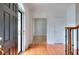 Open foyer showcasing hardwood floors, a staircase, and a glimpse into other rooms, offering a spacious feel at 2726 Riderwood Ne Ln, Marietta, GA 30062