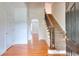 Bright foyer with hardwood floors, staircase, and neutral walls creating a welcoming entrance at 2726 Riderwood Ne Ln, Marietta, GA 30062