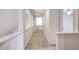 Upstairs hallway featuring light colored carpet and architectural wall cut-outs at 2726 Riderwood Ne Ln, Marietta, GA 30062