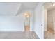 Hallway featuring light carpet, multiple doors and views to other rooms at 2726 Riderwood Ne Ln, Marietta, GA 30062