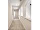 Upstairs hallway featuring light colored carpet and architectural wall cut-outs at 2726 Riderwood Ne Ln, Marietta, GA 30062