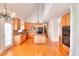 Open kitchen boasts wooden cabinets, granite counters, island, and stainless steel appliances at 2726 Riderwood Ne Ln, Marietta, GA 30062