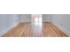 Spacious living room with hardwood floors and white walls, offering a clean and versatile space for decor at 2726 Riderwood Ne Ln, Marietta, GA 30062