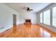 Spacious living room with hardwood floors, fireplace, and large windows at 2726 Riderwood Ne Ln, Marietta, GA 30062