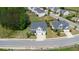 Beautiful two-story home with a manicured lawn, complemented by lush trees and charming neighborhood surroundings at 3985 Starwood Dr, Cumming, GA 30028
