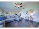 Spacious living room has a sectional sofa, dining area, and an open view of the kitchen at 3985 Starwood Dr, Cumming, GA 30028