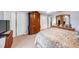 Spacious bedroom featuring neutral tones, a large wardrobe, and ample closet space at 4118 Stillwater Dr, Duluth, GA 30096