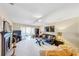 Bright living room featuring a fireplace, plush seating, and sliding doors leading to an outside living space at 4118 Stillwater Dr, Duluth, GA 30096