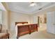 Comfortable bedroom with natural lighting, and access to the en-suite bathroom at 404 Carryback Dr, Marietta, GA 30068