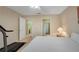 Cozy bedroom with neutral walls and carpet. Features a view to the bathroom and walk-in closet at 404 Carryback Dr, Marietta, GA 30068
