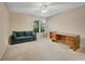 A bright bedroom featuring a sofa, desk, and chair at 404 Carryback Dr, Marietta, GA 30068