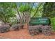 Mulberry Farms community sign surrounded by lush landscaping and trees in a well-maintained setting at 404 Carryback Dr, Marietta, GA 30068