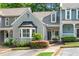 Charming townhome with well-maintained landscaping and inviting curb appeal at 404 Carryback Dr, Marietta, GA 30068