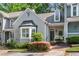 Charming townhome with well-maintained landscaping and inviting curb appeal at 404 Carryback Dr, Marietta, GA 30068