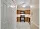 Traditional kitchen featuring oak cabinets and white tile flooring at 404 Carryback Dr, Marietta, GA 30068