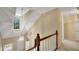 Bright staircase featuring a large window and overhead light fixture at 404 Carryback Dr, Marietta, GA 30068