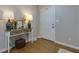 Light and bright entryway with hardwood floors and a stylish console table at 4147 Suzanne Ln, Duluth, GA 30096
