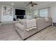 Cozy living room featuring a fireplace, built-in shelving and a comfortable sectional sofa at 4147 Suzanne Ln, Duluth, GA 30096