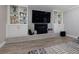 Bright living room features a fireplace, built-in shelving, and modern decor at 4147 Suzanne Ln, Duluth, GA 30096