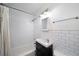 Bathroom with white subway tile, modern vanity, and shower-tub combo at 120 Alden Nw Ave # C3, Atlanta, GA 30309
