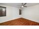 Bedroom showcasing hardwood floors, ceiling fan, and window with blinds at 120 Alden Nw Ave # C3, Atlanta, GA 30309