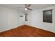 Bright bedroom featuring hardwood floors, ceiling fan, and natural light at 120 Alden Nw Ave # C3, Atlanta, GA 30309