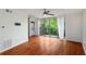 Spacious living area includes hardwood floors, sliding glass doors to balcony, and convenient in-unit laundry at 120 Alden Nw Ave # C3, Atlanta, GA 30309
