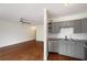 Open-concept living room flows into the updated kitchen, with modern finishes at 120 Alden Nw Ave # C3, Atlanta, GA 30309