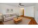 Comfortable living room with neutral tones, hardwood flooring, and a ceiling fan at 120 Alden Nw Ave # C3, Atlanta, GA 30309