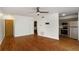Open concept living area flows into a modern kitchen with stainless steel appliances and gray cabinets at 120 Alden Nw Ave # C3, Atlanta, GA 30309