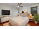 Inviting bedroom boasts hardwood floors, a ceiling fan, and abundant natural light at 120 Alden Nw Ave # C3, Atlanta, GA 30309