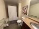 Bathroom features a tub with shower and single sink vanity at 170 Boulevard Se # H301, Atlanta, GA 30312