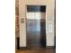 A modern stainless steel elevator with a brick wall on either side of the doorway providing easy access to different levels at 170 Boulevard Se # H301, Atlanta, GA 30312