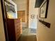Hallway view featuring a wooden dresser and unique decor at 170 Boulevard Se # H301, Atlanta, GA 30312
