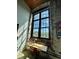 Cozy office nook with exposed brick and large window, perfect for work or study at 170 Boulevard Se # H301, Atlanta, GA 30312