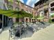 Community lounge area beside a pool featuring plenty of outdoor seating and shade umbrellas at 170 Boulevard Se # H301, Atlanta, GA 30312