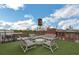 Inviting rooftop deck features seating, a water tower, and city skyline views at 170 Boulevard Se # H301, Atlanta, GA 30312