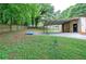 Commercial building with carport and green space is ready for your business at 200 Rogers Rd, Kingston, GA 30145