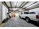 Photo of large garage with two work trucks, metal frame and white ceiling at 200 Rogers Rd, Kingston, GA 30145