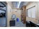View of the office inside the garage, complete with window and furnishings at 200 Rogers Rd, Kingston, GA 30145
