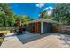 Charming home featuring a private backyard with a patio area for outdoor relaxation and dining at 2462 Pate S St, Snellville, GA 30078