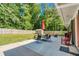 Spacious backyard with patio, shed, and ample green space perfect for outdoor activities at 2462 Pate S St, Snellville, GA 30078