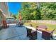 Well-maintained backyard with lush green lawn, patio, and comfortable outdoor seating at 2462 Pate S St, Snellville, GA 30078